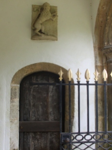 Stone lion in Fotheringhay Church entrance